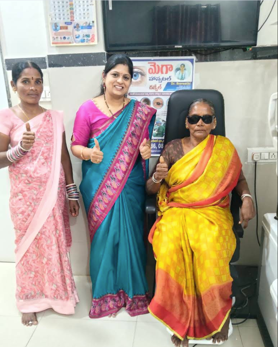 Patient after successful cataract surgery with doctor